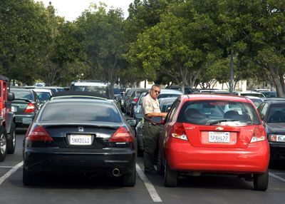 <strong>MICHAEL KARAKASH |</strong> Staff Photographer<br>UCI Parking and Transportation tickets aggressively to prevent students from parking without a permit.